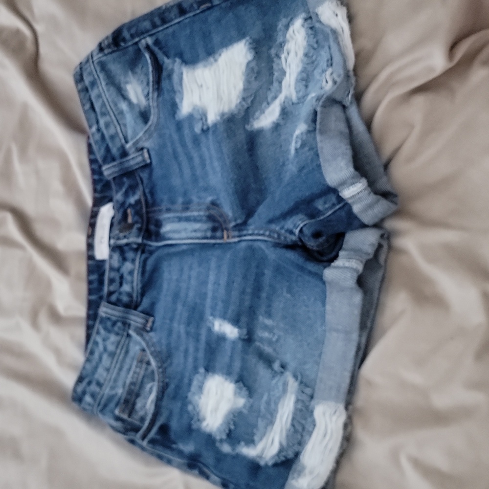 Distressed denim shorts